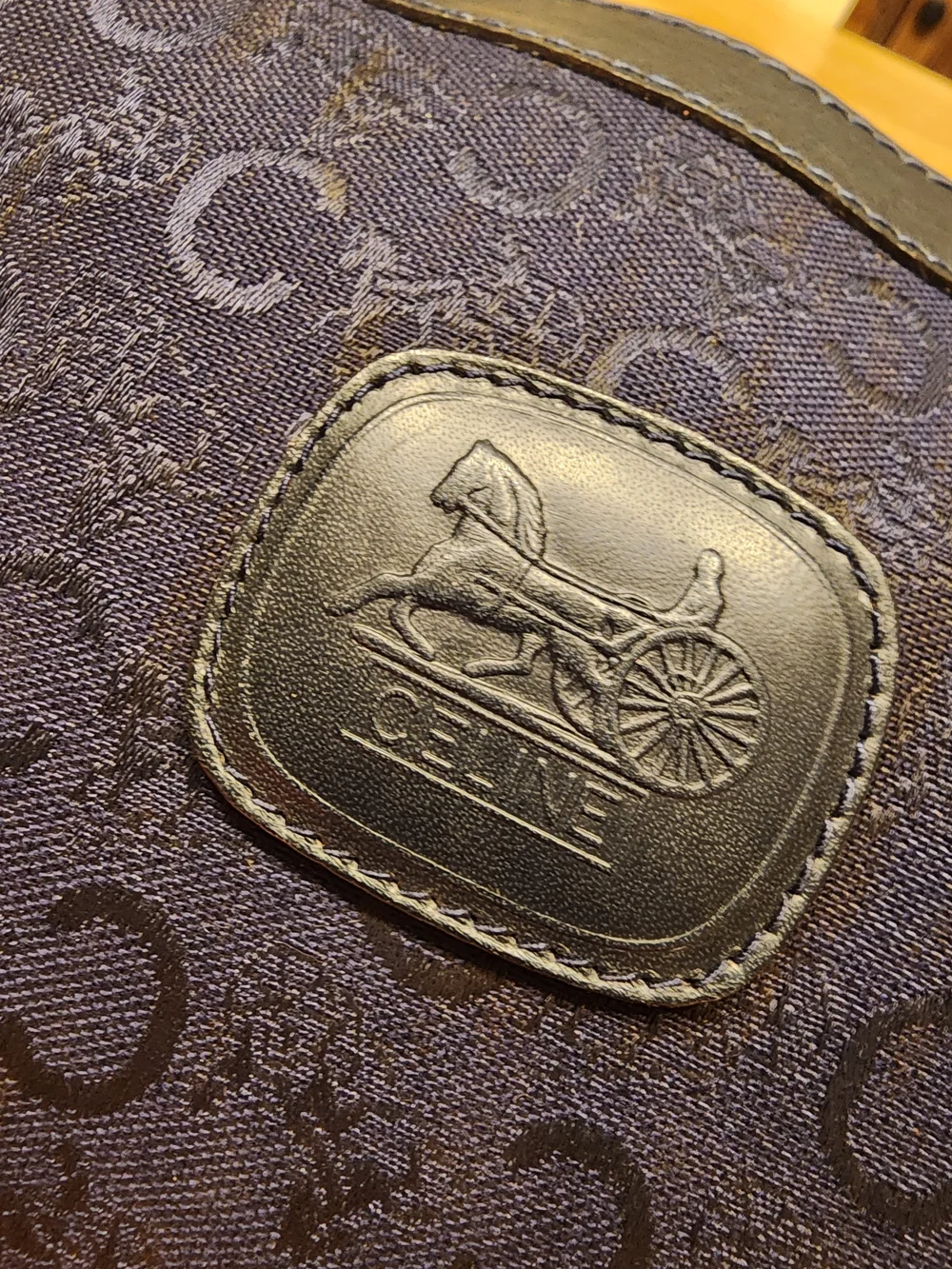 vintage item is a Celine C Macadam Horse Carriage Toiletry/Cosmetic Pouch,